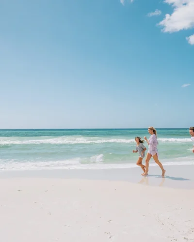 Seaside, FL beach | People running by the beach