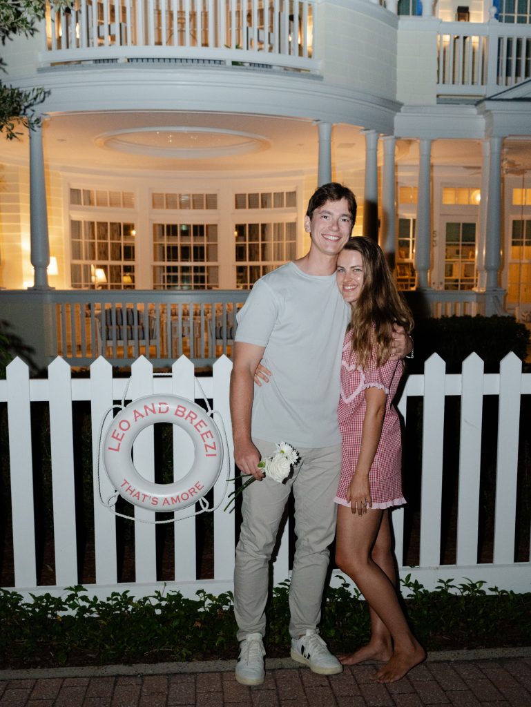 couple in front of a house in seaside florida