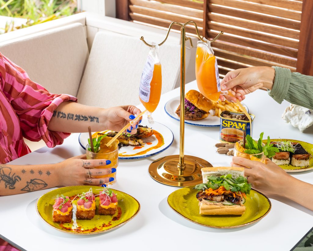 Couple enjoying Dinner and Drinks Seaside Florida Daytrader