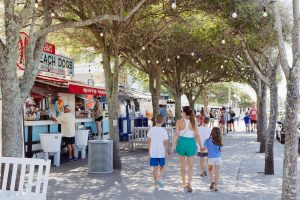 Airstream Row food trucks and visitors at the Seaside, Florida town center in summer